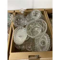 Large collection of glassware, to include uranium vase, cranberry glass jug, ship decanter, jelly moulds, jugs etc, in six boxes   
