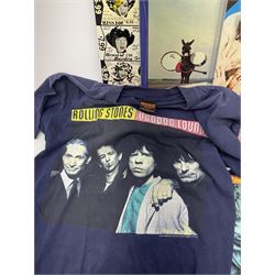 Collection of The Rolling Stones memorabilia, including LPs Goats Head Soup, Still Life, Through the Past, Darkly, Get Yer YA-Ya's Out and Some Girls, Three concert t-shirts, a cup from 94/95 tour and ticket stubs, Crystal head vodka bottle in box, two books. 