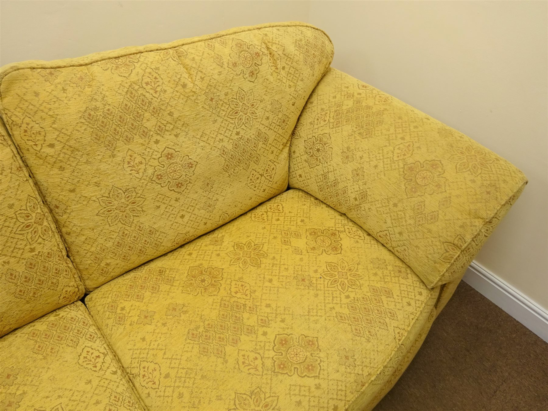 Marks and Spencer's three seat sofa upholstered in a floral patterned
