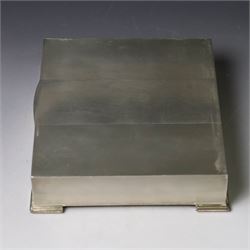 1960s silver mounted cigarette box, of rectangular form with engine turned decoration, upon four bracket feet, with presentation engraving to interior lid reading  'British Aircraft Corporation (Operating) Limited Commemorating the Queen's Award to Industry 1967, hallmarked James Geraghty, Birmingham 1965, with retailers mark for Asprey, W16.5cm, H4.5cm, in Garrard & Co Jewellers box