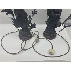 Pair of Art Nouveau style spelter figural table lamps, each mounted on rouge marble effect circular bases, with toleware flower heads and leafy decoration surrounding a female figure, H90cm