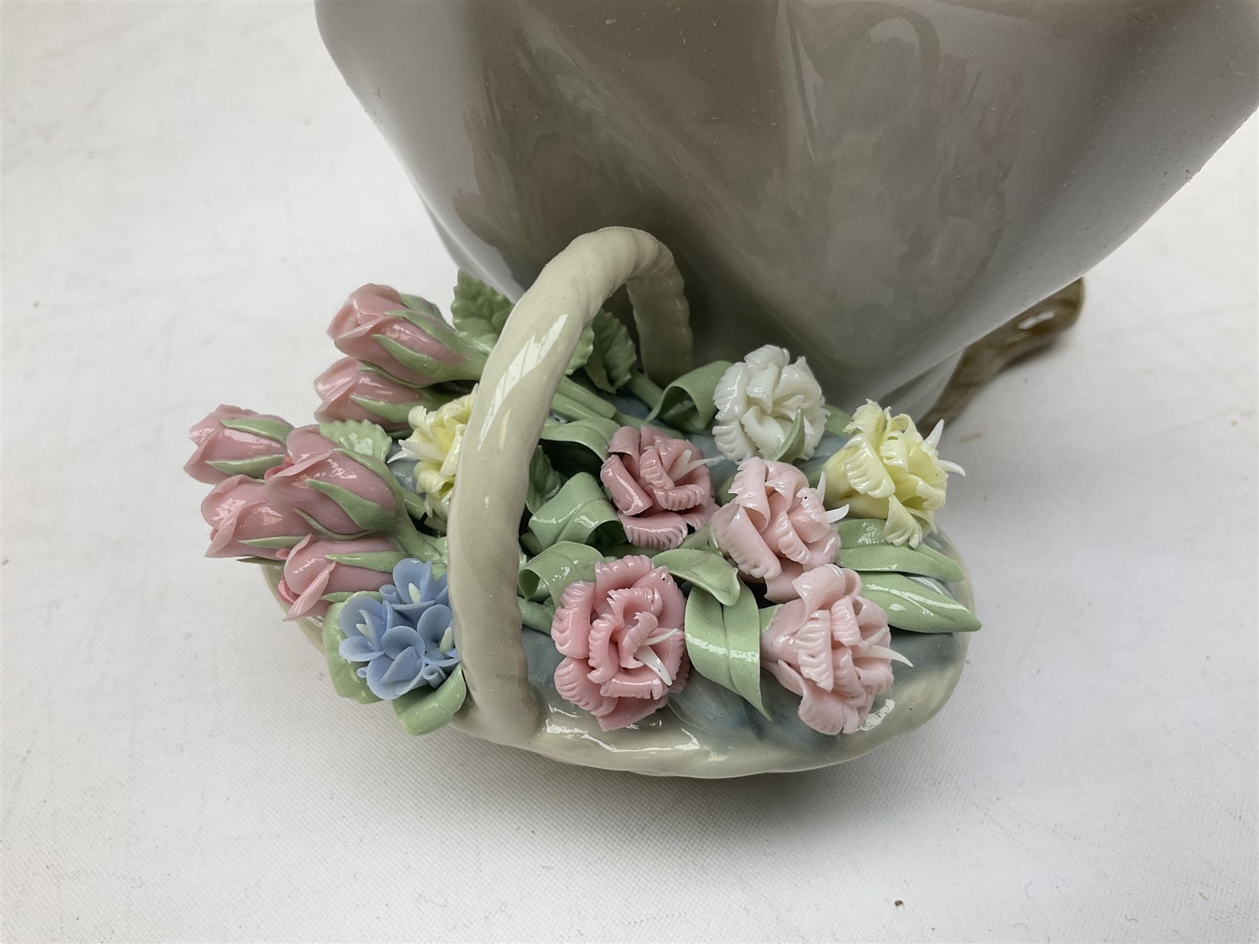 Three Lladro figures, comprising Pondering, no 5173, Nostalgia, no 5071 and Nature's Bounty, no 1417, all with original boxes, largest example H27cm