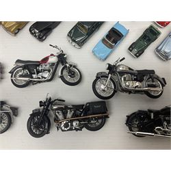 Over forty 1:76 scale die-cast models of cars and commercial vehicles; some boxed; and eight small scale models of motorcycles; all unboxed