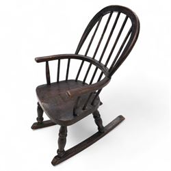 19th century child's Windsor rocking chair, double hoop and stick back, dish seat on turned supports united by rockers 