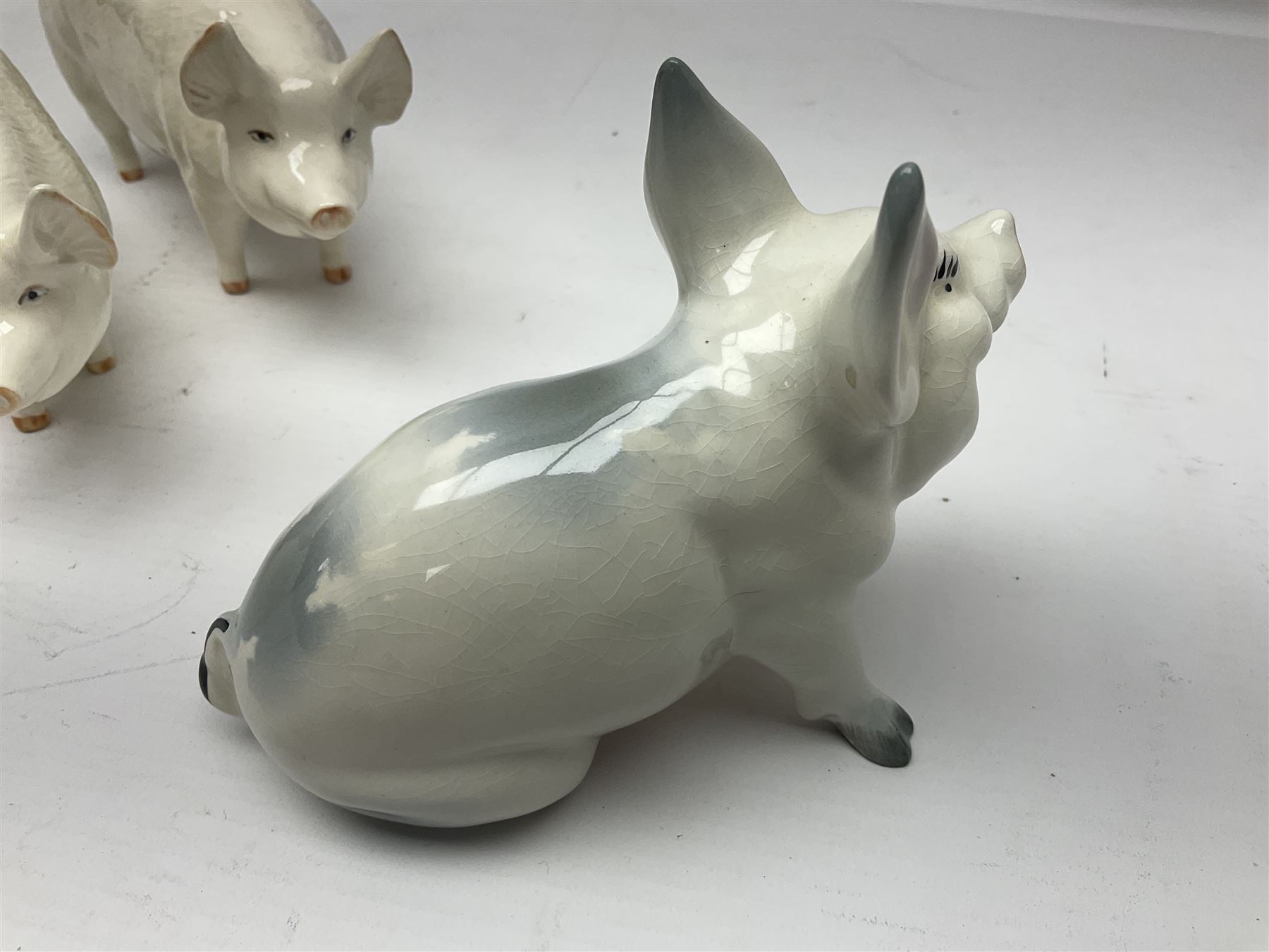 Three Beswick pigs, CH Wall CH Boy 53, 8cm high, CH Wall Queen and seated pig no 839