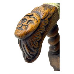 19th century Carolean design oak armchair, upholstered in a vibrant fabric depicting woodland and wildlife scenes, carved lion mask arm terminals, raised on barley twist supports united by H-stretcher