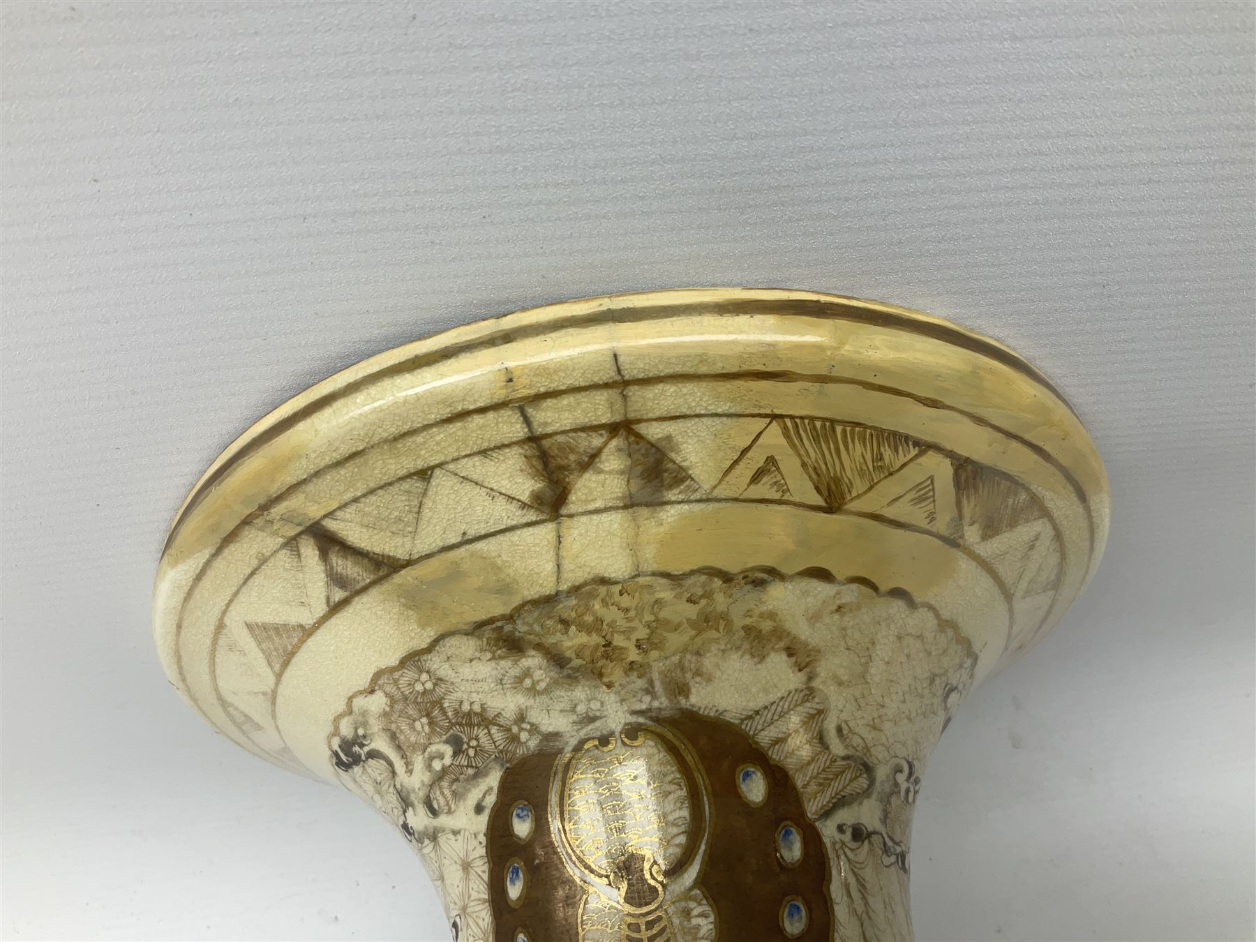 Pair early 20th Century Japanese floor vases of ovoid form, painted with warriors and elders within geometric designs and gilding, H61cm