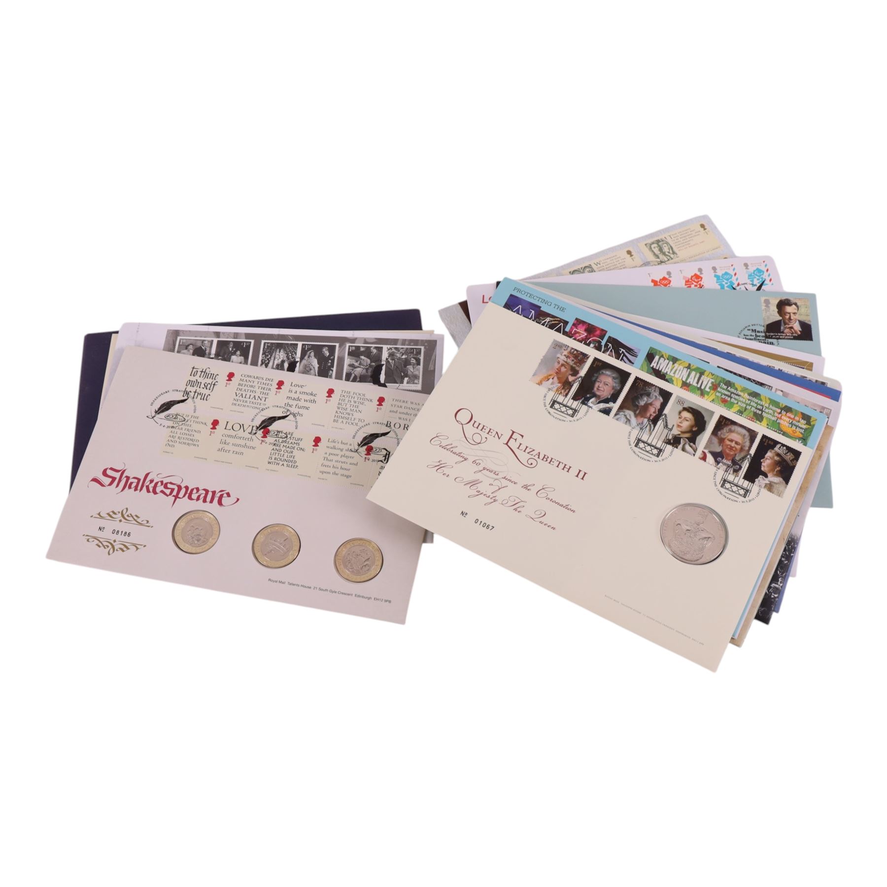 Approximately 79 Royal Mail Royal Mint coin or medallion covers, including 2016 'Shakespeare' three coin cover, housed in two Royal Mail ring binder folders and loose