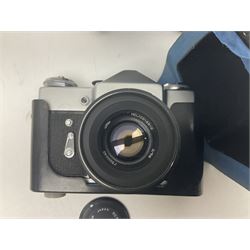 Collection of camera bodies and lenses, to include Olympus OM-1 camera body, serial no 106567, with 'Olympus OM-System F.Zuiko Auto-S 1:1.8 f=50mm' lens, serial no 135097,  Zenit-B camera body, serial no 71017867, with 'Helios-44-2 2/58' serial no 7500040, Voigtlander Vito B camera body, with 'Voigtlander Colour Skopar 1:2.8/50' lens, 'Olympus OM-System Zuiko Auto-Zoom 1:4 f=75-150mm' lens serial no 104321, 'Tamron SP 35-210mm 1:3.5-4.2' lens etc 