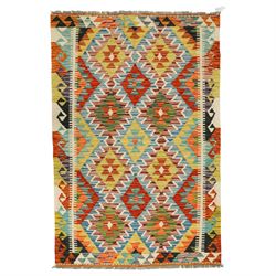 Chobi kilim with staggered diamond and stepped lozenge motifs in a palette of mustard, rus...