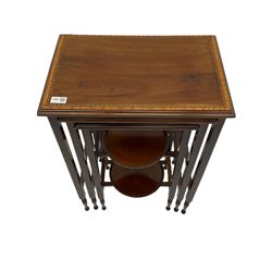 Edwardian mahogany nest of tables, rectangular moulded tops with satinwood band, square supports terminating at turned feet, the smallest table with two integrated cake stands 