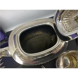 Mother of Pearl handled cutlery, with silver ferrules, comprising six fish knives and forks and six fruit knives and forks, the ferrules hallmarked Yates Brothers, Sheffield 1905, together with silver plated Edwardian three piece tea service and other flatware 