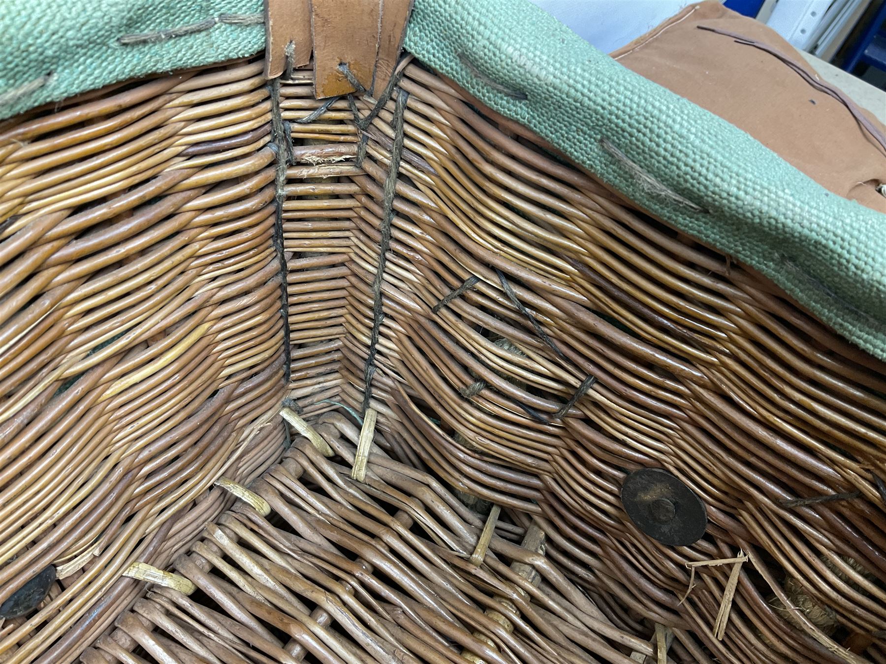 WW2 British Army RAMC 'Regimental Medical Pannier', well marked externally and dated 1941, stamped May 1943 internally, canvas covered wicker form with leather edges, hinged top and fall front with two rope carrying handles, fitted iron locking straps with securing chains; contains various unused field dressings and bandages with WW2 dates and two pillows; original label under lid L79cm