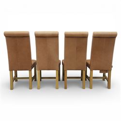 Modern large oak plank top dining table and twelve brown leather high back chairs, table of rustic construction five solid planks with exposed supports, the chairs in brown leather hide with ten standard height and a pair of taller chairs for the foot and head of the table