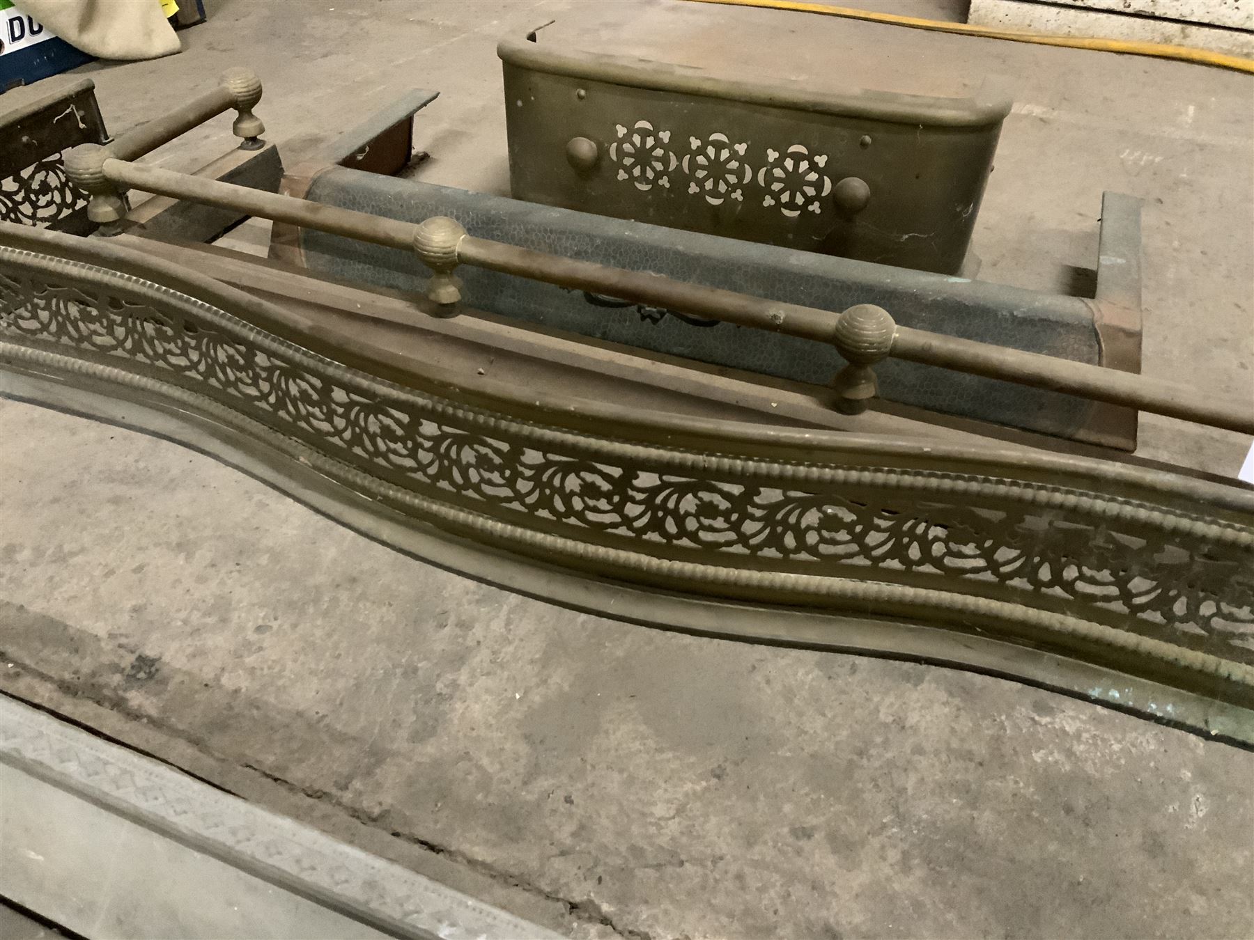 Victorian pierced brass fire fender, brass fender, three kerbs and a