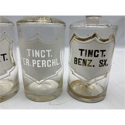 Three Victorian apothecary chemist bottles complete with labels and glass stoppers, H22cm