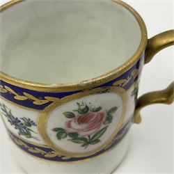 19th Sèvres style porcelain cup and saucer, the cup painted with a figural scene, against a scalloped border of scrolling floral swags on a blue ground, together with a Sèvres soft paste porcelain coffee can and saucer, painted with panels of exotic birds, roses and a border of cornflowers, LL monogram enclosing date letters H above painters mark, coffee can H6.5cm, saucer D13.5cm (2)