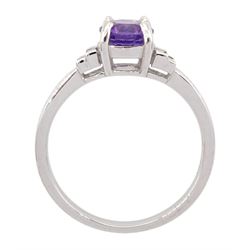 18ct white gold round cut purple sapphire ring, with two baguette cut diamonds set either side, stamped 750, sapphire approx 1.00 carat