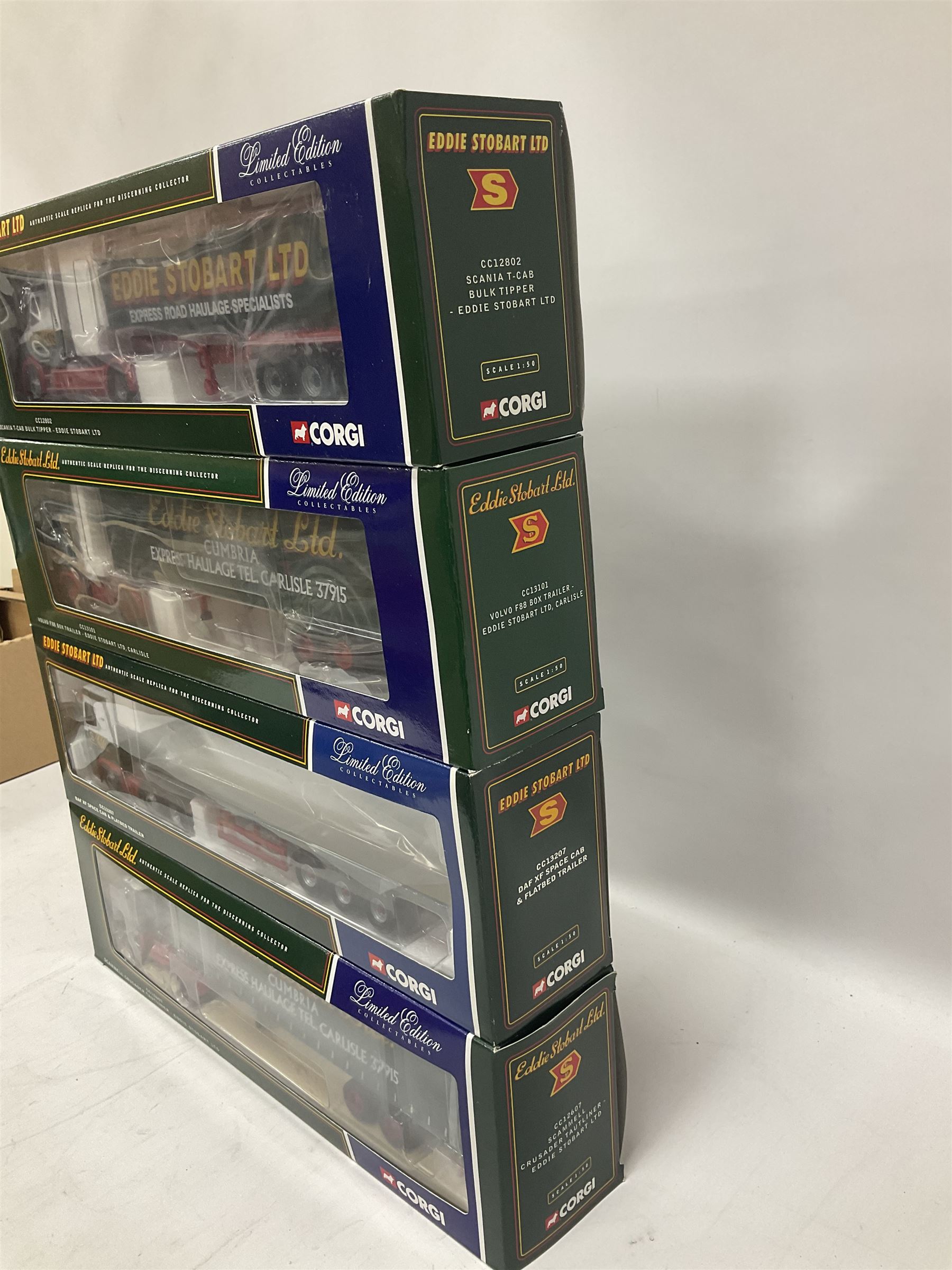 Corgi - four limited edition 1:50 scale Eddie Stobart heavy haulage vehicles comprising CC12802 Scania T-Cab Bulk Tipper; CC13207 DAF XF Space Cab and Flatbed Trailer; CC13101 Volvo F88 Box Trailer; and CC12607 Scammell Crusader Tautliner; all boxed (4)