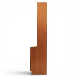 Nathan - teak corner cabinet, the upper section with moulded cornice and two fixed shaped open shelves, above a curved corner cupboard with twin signature square panelled doors, on a shaped plinth