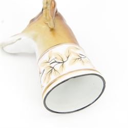 Late 19th century Continental porcelain stirrup cup, modelled as a hounds head, with wide collar detailed with lustre vines, H14.5cm