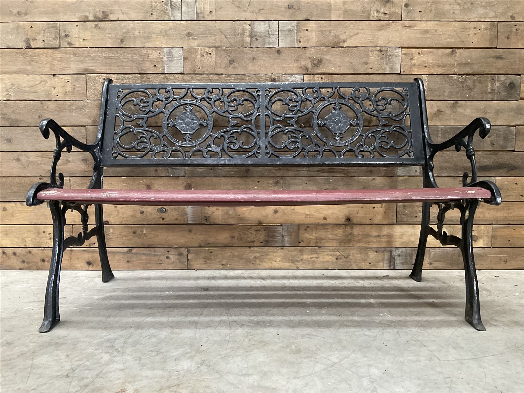 Cast iron and wood slatted garden bench
