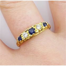 18ct gold five stone sapphire and diamond ring, with scroll detail to shoulders and gallery, London 1989
