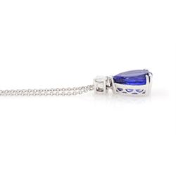 18ct white gold tanzanite and diamond necklace, single pear cut tanzanite of approx 7.60 carat, suspending from a single round brilliant cut diamond of approx 0.45 carat, to a fine belcher link chain necklace, hallmarked