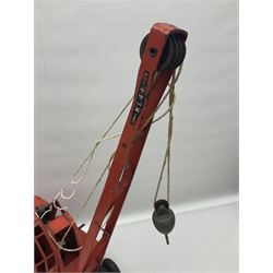 Mamod TE1a steam traction engine with burner, bunker, steering rod and funnel; red and black painted Tri-ang tin-plate Jones KL44 mobile crane; and two Hull Savings Bank Home Safe money boxes; all unboxed (4)