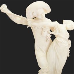 Alabaster bacchanalian figure group, modelled as two youths dancing entwined with a fruiting vine, the separate base signed D E Fiaschi, H58cm