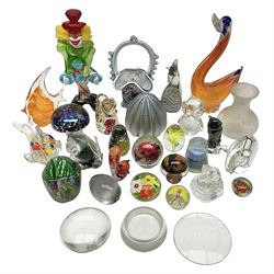 Robert Held iridescent art glass sea urchin paperweight, signed to underside, together with Murano glass clown and a collection of other glass paperweights and animals, etc 