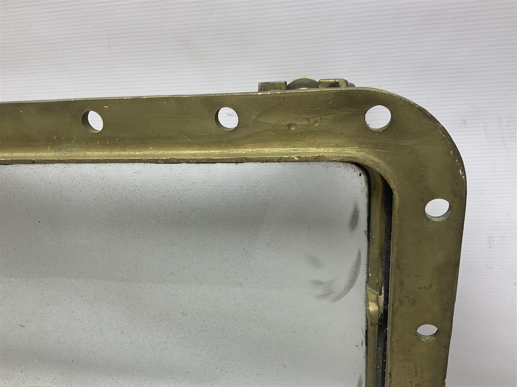 Rectangular brass porthole with hinged window, H46cm, L66cm