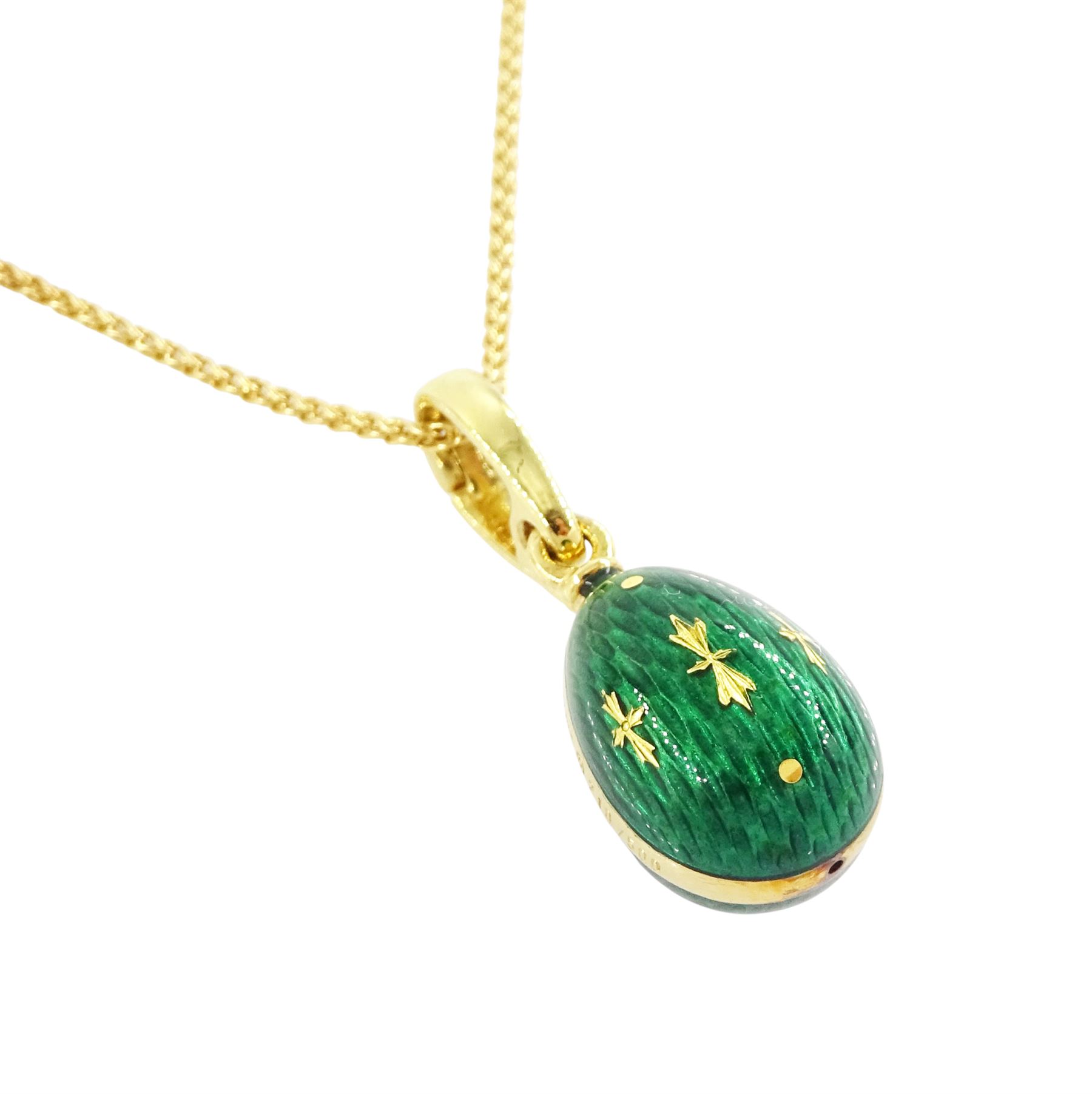 Fabergé 18ct gold enamel egg pendant, Ref. F-1310, green guilloche enamel egg, with hinged bail, designed by Victor Mayer for Fabergé, on 18ct gold wheat chain necklace, boxed with papers