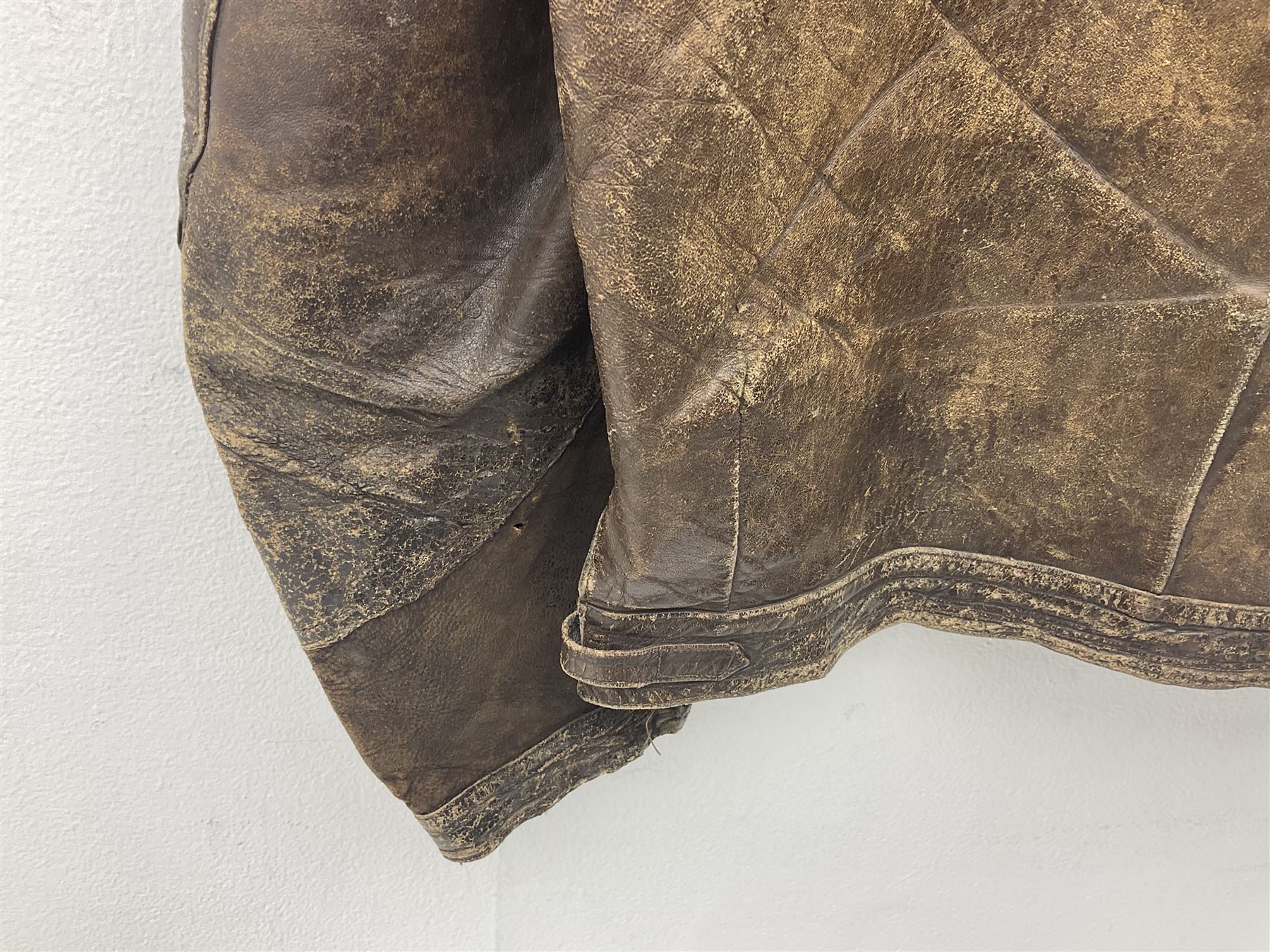 German Luftwaffe Hartmann leather jacket with tartan pocket linings, pocket zip pulls marked 'Eclair Bte.S.G.D.G.'