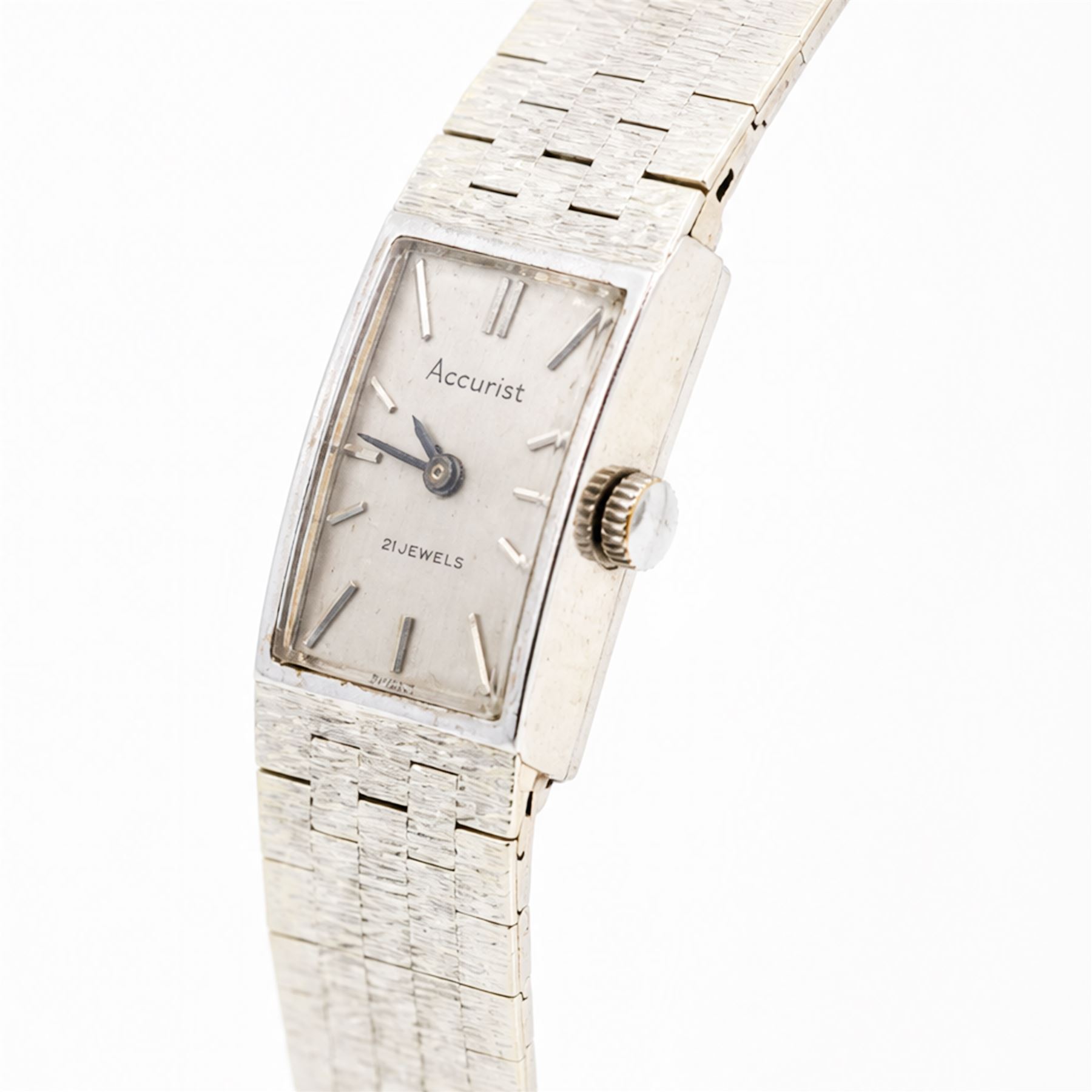 Accurist ladies 9ct white gold manual wind wristwatch, silvered dial with baton hour markers, on integral 9ct bracelet, London 1969