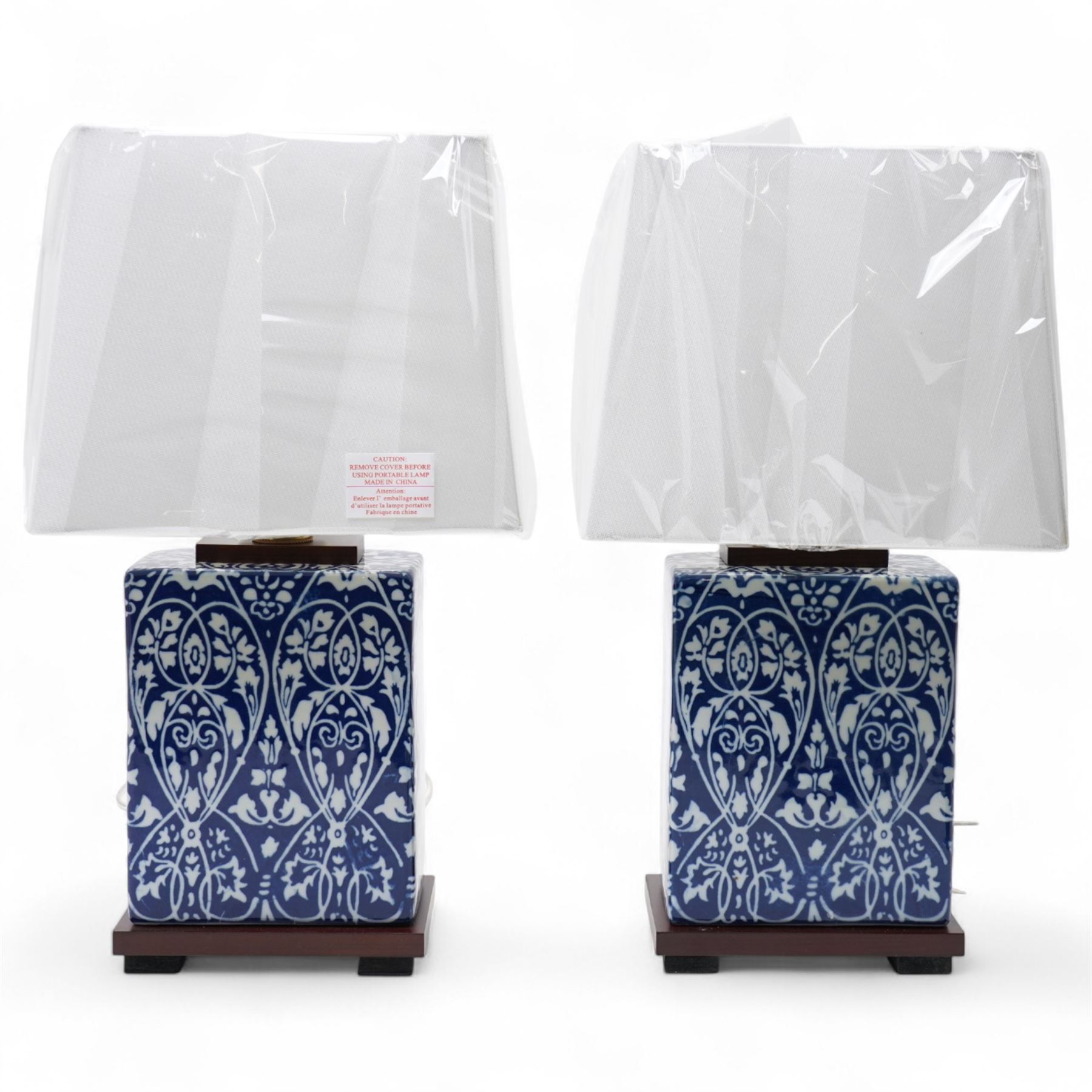 Pair of Ralph Lauren blue and white table lamps, with shades, H41cm