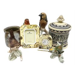 Four Goebel figures of birds, to include Robin and Firecrest, Marzi & Remy MR Germany stoneware lidded jar 'Dit is die Schone Historia ...', Wedgwood Atlas clock and picture frame and a studio pottery mug, tallest H16cm