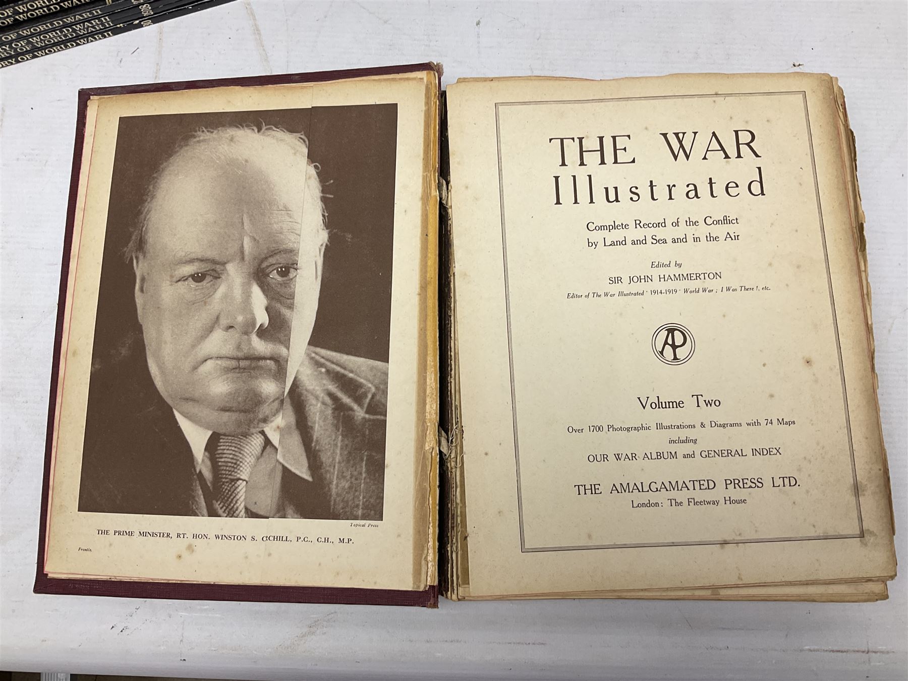 Three boxes of books, periodicals and DVDs of military interest with particular emphasis on WW2 including The History of World War Two in thirty original parts by Orbis, The D-Day Experience by Richard Holmes, The World War Two Databook, The World at War, Special Forces etc