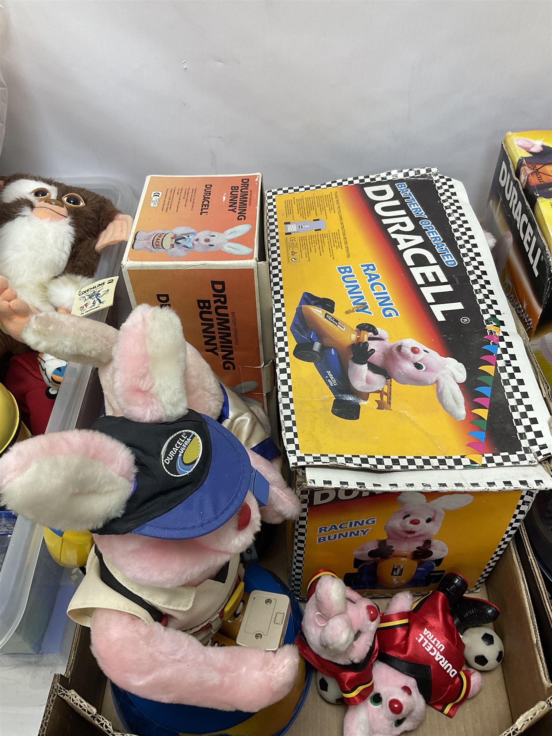 Collection of Duracell Bunny collectibles to include Racing Bunny, Fireman Bunny, Dancing Bunny etc in original boxes; Bandai collectable characters, Gremlins 2 Gizmo plushies from Applause, further soft toys and collectables etc, in three boxes 