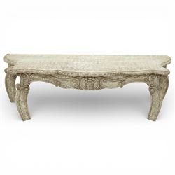 French style low console table, the shaped rectangular top with undulating outline and mou...