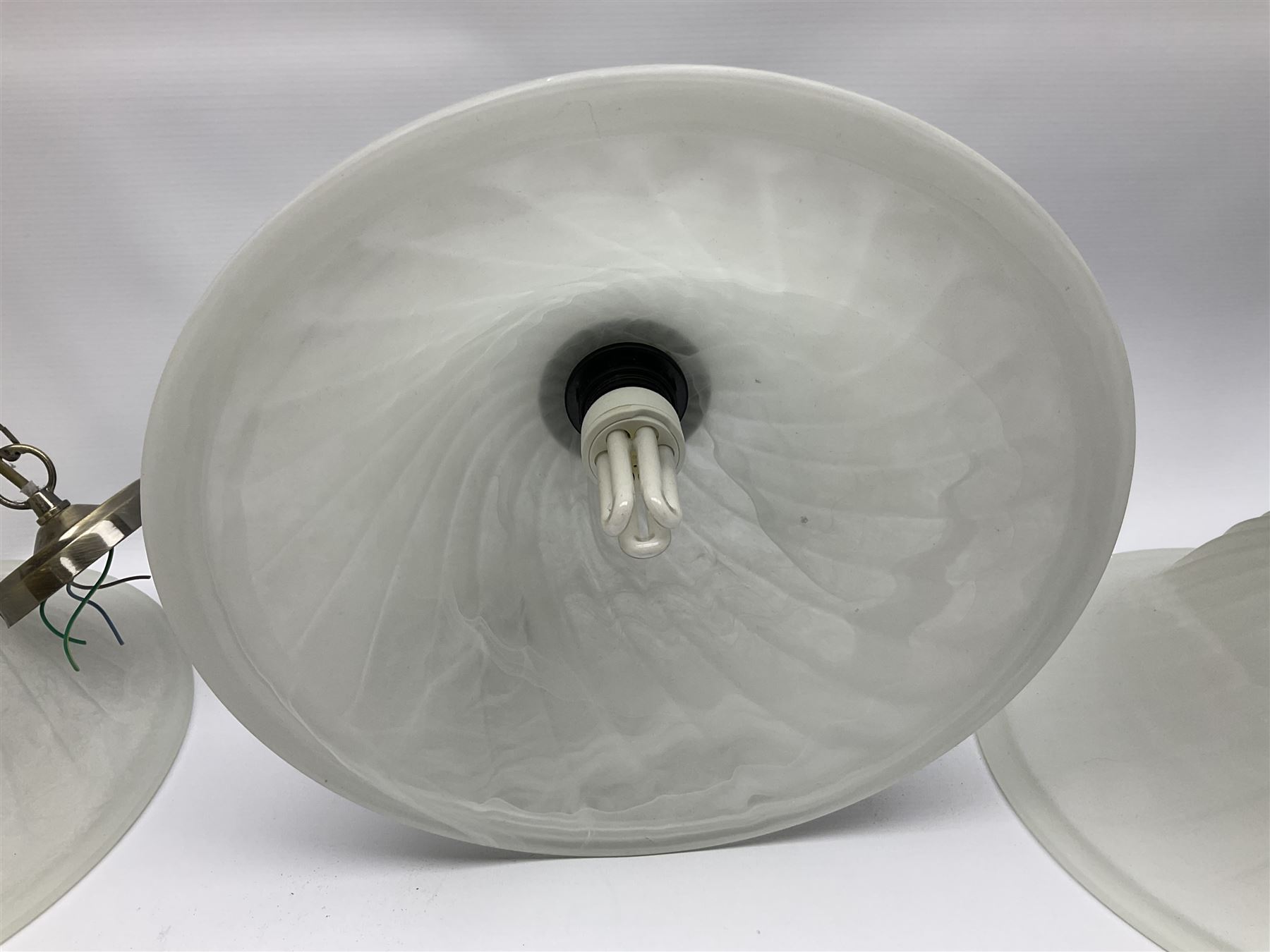 Three frosted glass light fittings with brushed metal mounts, approx L30cm excl fitting
