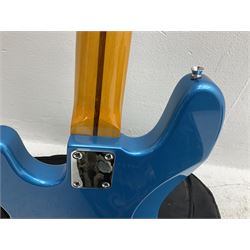 Richwood electric bass guitar in blue, cream and natural finish L117cm; in Fender soft carrying case; together with Behringer Thunderbird Bx108 amplifier date code 0 4 11.