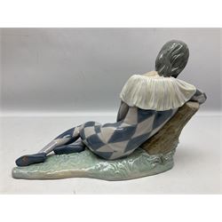 Lladro figure, Harlequin Reclining, modelled as a recumbent harlequin, no 5128, Sculpted by Salvador Furio, year issued 1982, year retired 1987, H28cm 