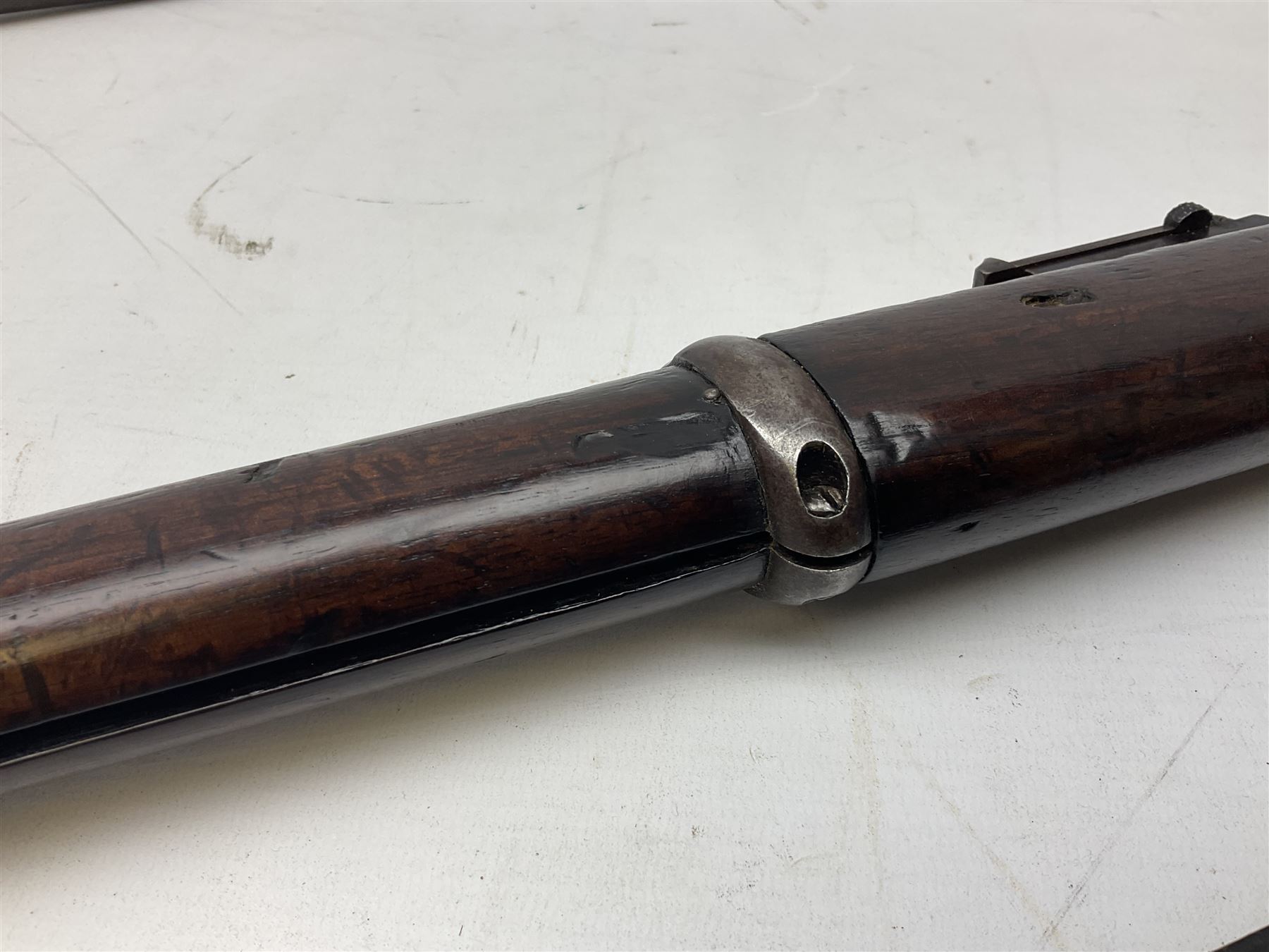 Braendlin Armoury Martini action .577/450 falling back rifle, the 85cm rifled barrel stamped Alex. Henry Edinburgh & London with two barrel bands including Yatagan bayonet side fitting and clearing rod under, with leather sling, serial no.13332, L126cm (NB. Firing pin broken). 