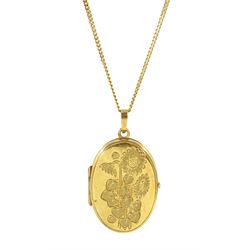 9ct gold oval locket pendant necklace, with engraved flower decoration, hallmarked