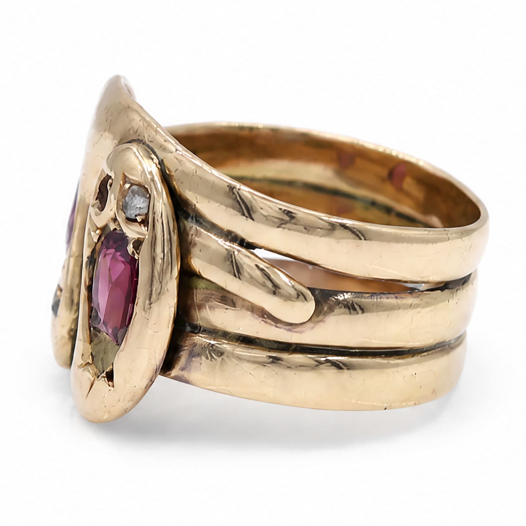 Edwardian 9ct rose gold garnet and diamond double coiled snake ring, set with rose cut diamonds and pear cut garnet, Chester 1907