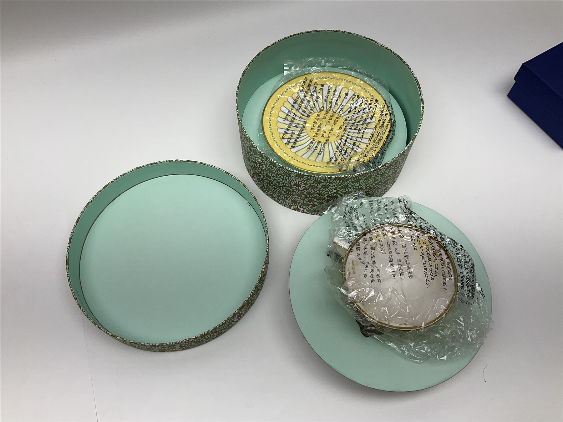 Wedgwood Yellow Ribbons cabinet cup and saucer, boxed and a Swarovski butterfly, boxed (2)