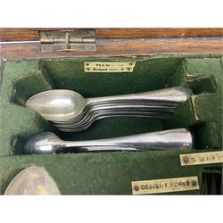Walker and Hall silver plated canteen of cutlery, oak case, the hinged lid with a engraved brass shield , H12cm, L32cm