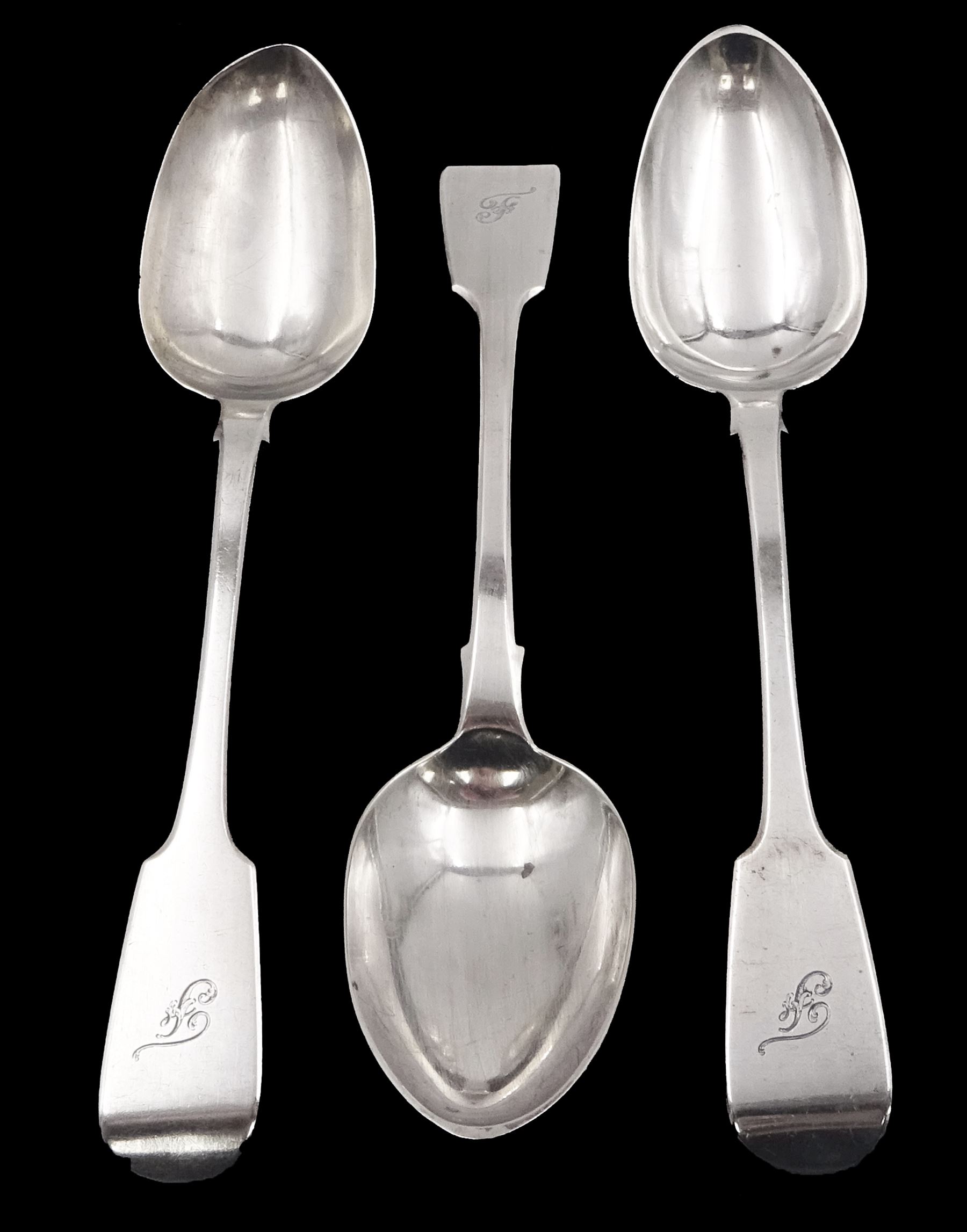 Three Victorian silver Fiddle pattern table spoons, each with engraved initial to terminal, hallmarked James Barber, York 1847