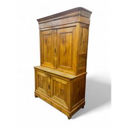 19th Century French walnut dresser, the moulded cornice over two-panelled cupboard doors, ...
